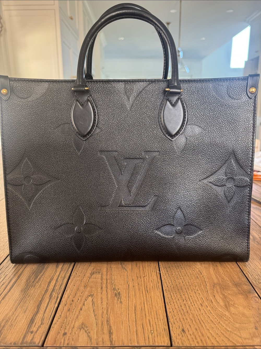 Louis Vuitton Black Embossed Monogram On-The-Go MM Leather Tote